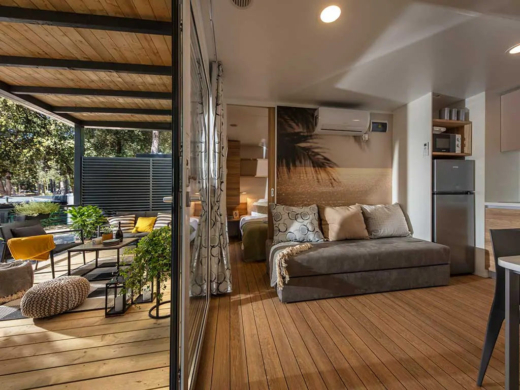 campsite-porton-biondi-mobile-homes-with-pool-terrace-with-interior
