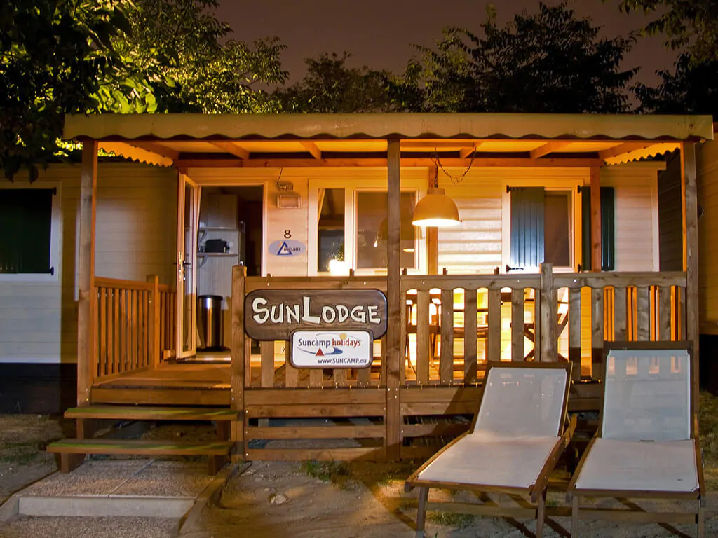 mobile-home-sunlodge-redwood-exterior-terrace-night-time