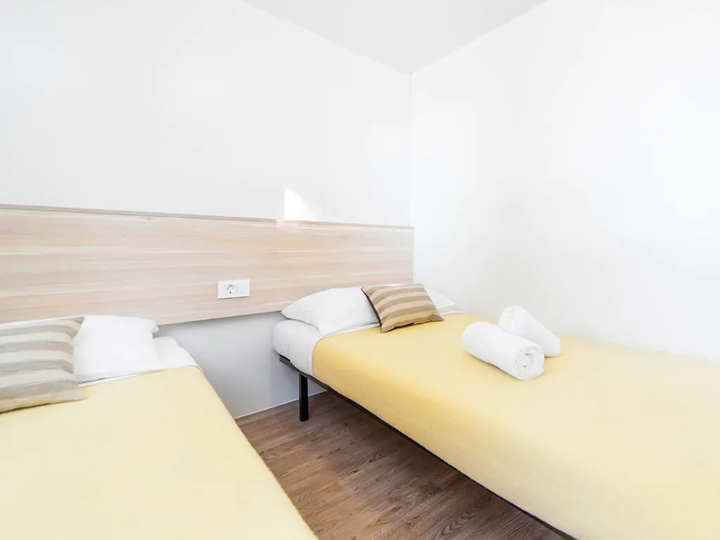 camping-paklenica-bluesun-interior-of-double-bed-bedroom-of-mobile-homes-for-6-plus