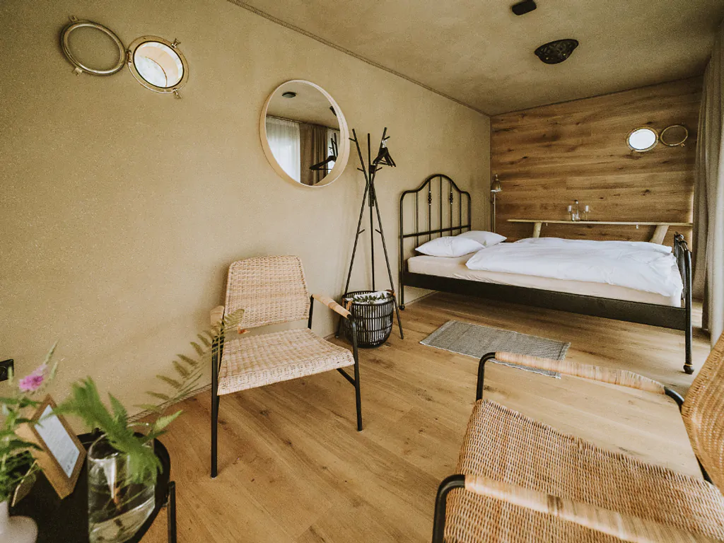 falkensteiner-premium-camping-lake-blagus-lake-house-shore-row-house-interior-living-room