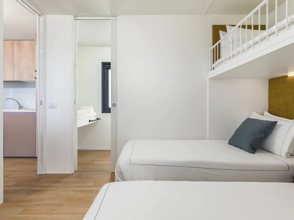 camping-arena-stupice-mobile-home-camping-home-sea-view-interior-bedroom-single-beds-view-2
