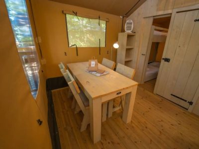 small-orlando-safari-tent-living-room-with-dining-table