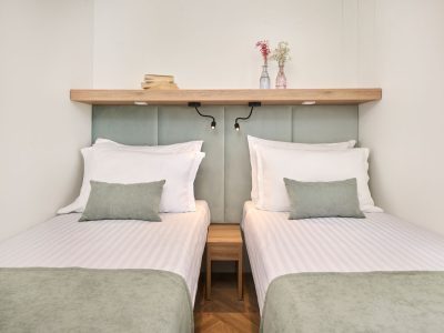 aminess-atea-camping-resort-luxury-glamping-villa-interior-bedroom-single-beds-view