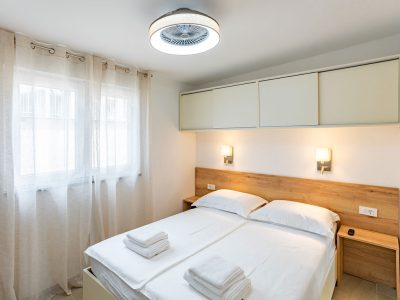 camping-arti-homes-rab-mobile-home-arti-studio-four-interior-bedroom-double-bed