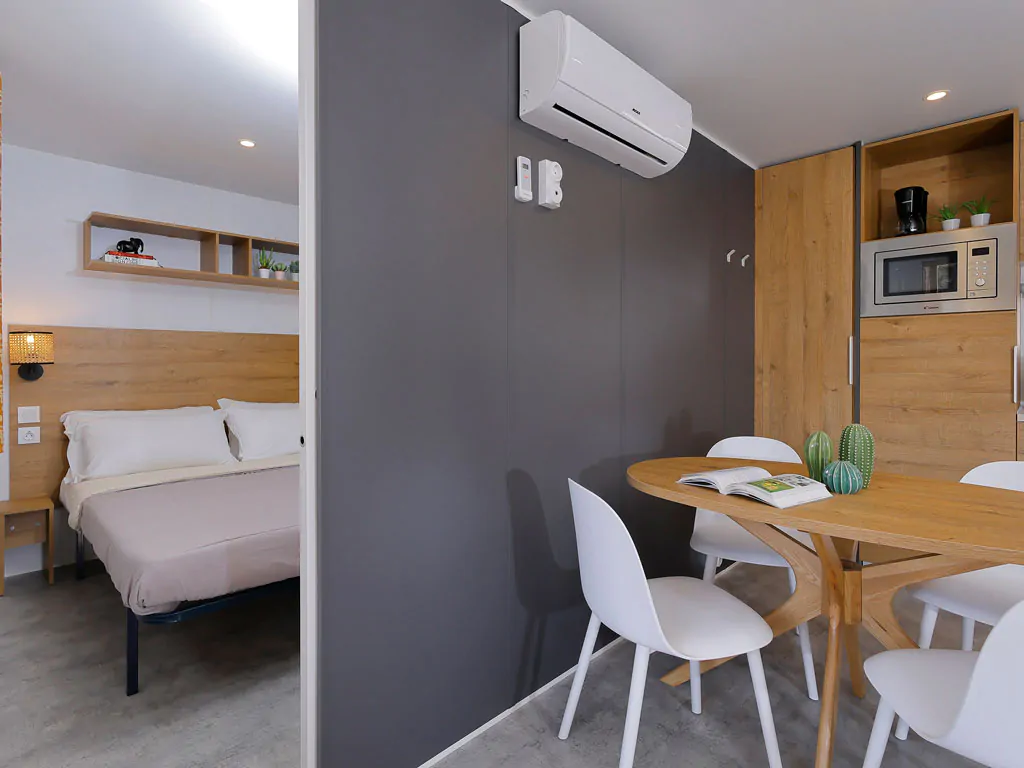 hu-venezia-camping-in-town-mobile-home-hu-stay-premium-interior-livingroom-bedroom